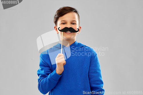 Image of smiling boy in blue hoodie with black moustaches