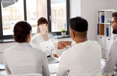 Image of recruiters having job interview with employee