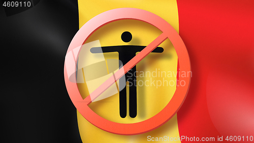 Image of Warning sign with crossed out man on a background Belgian flag.