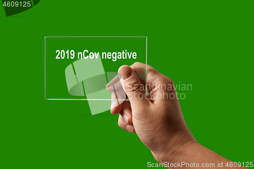 Image of Hand with negative test for 2019 nCov.