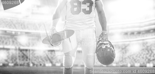 Image of closeup American Football Player isolated on big modern stadium