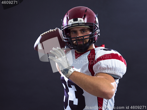 Image of american football player throwing ball