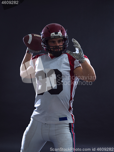 Image of american football player throwing ball