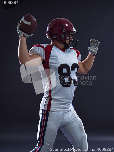 Image of american football player throwing ball