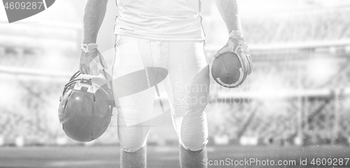 Image of closeup American Football Player isolated on big modern stadium