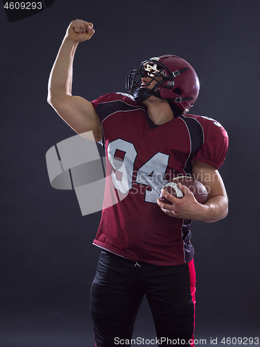 Image of american football player celebrating touchdown