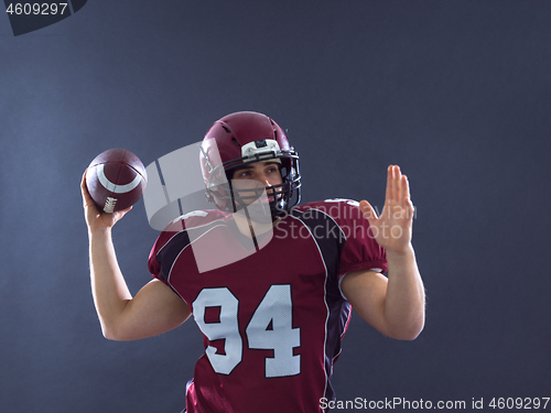 Image of american football player throwing ball