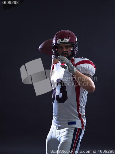 Image of american football player throwing ball