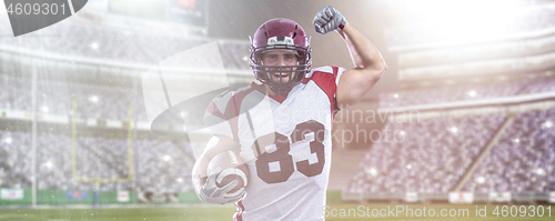 Image of american football player celebrating touchdown