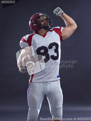 Image of american football player celebrating touchdown