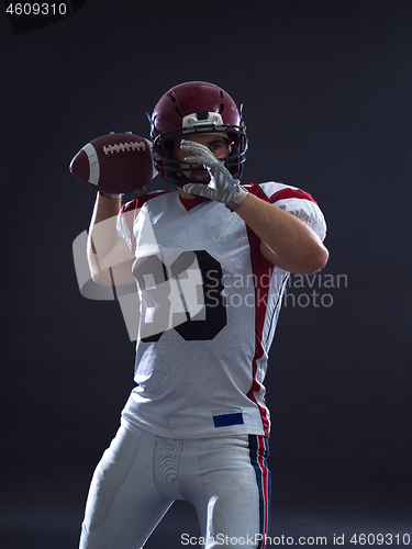 Image of american football player throwing ball