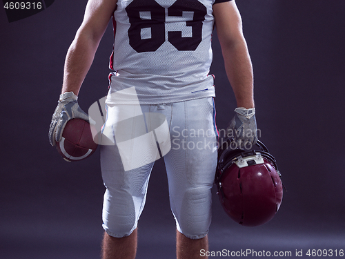 Image of closeup American Football Player isolated on gray