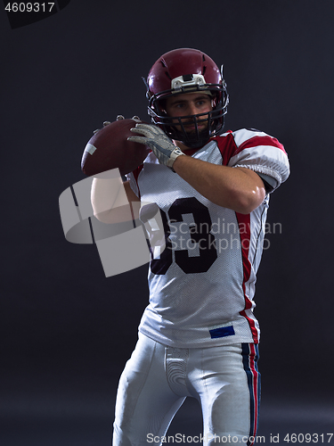 Image of american football player throwing ball