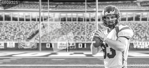 Image of american football player throwing ball