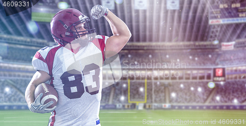 Image of american football player celebrating touchdown