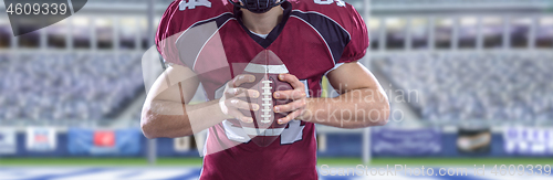 Image of closeup American Football Player isolated on big modern stadium