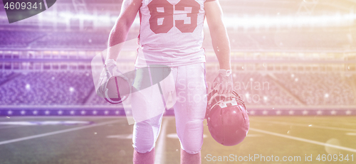 Image of closeup American Football Player isolated on big modern stadium