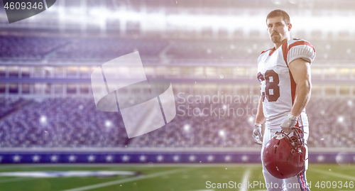 Image of American Football Player isolated on big modern stadium field