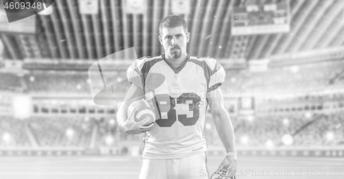 Image of American Football Player isolated on big modern stadium field