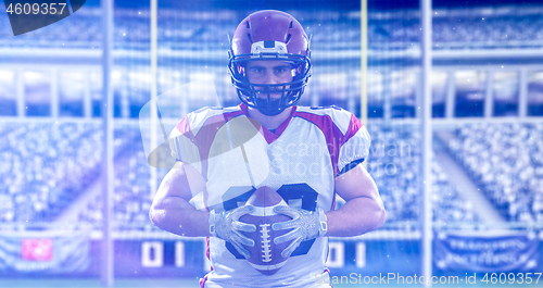 Image of American Football Player isolated on big modern stadium field