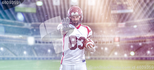 Image of portrait of confident American football player