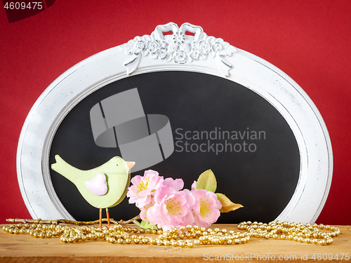 Image of bird with a branch of blossoms easter holiday decoration backgro