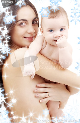 Image of clean baby in mother hands