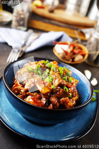 Image of fried cabbage with meat