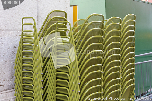 Image of Stacked Green Chairs