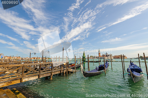 Image of Venice, Italy, Gondolas parked in Grand Canal