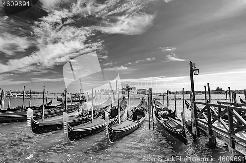 Image of Venice, Italy, Gondolas parked in Grand Canal