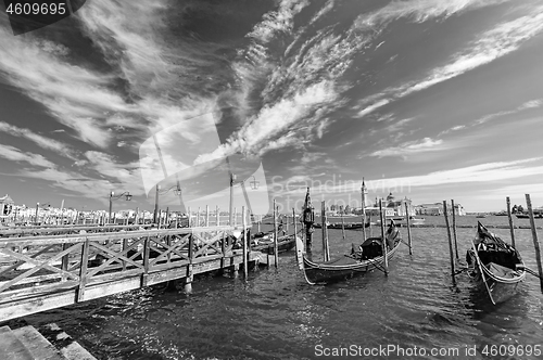 Image of Venice, Italy, Gondolas parked in Grand Canal