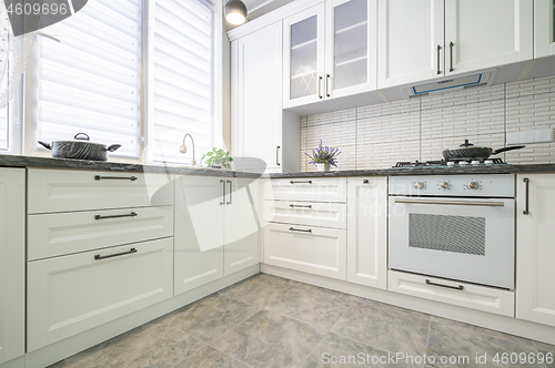 Image of Modern white kitchen interior