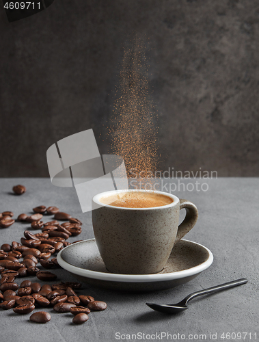 Image of cinnamon splashes in a coffee mug