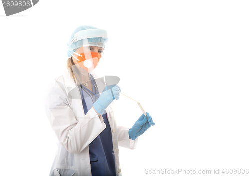 Image of Healthcare worker holding a nose and throat swab