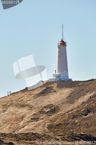 Image of Old White Lighthouse on a hill