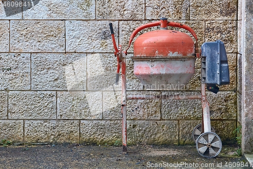 Image of Concrete mixer in a backyard