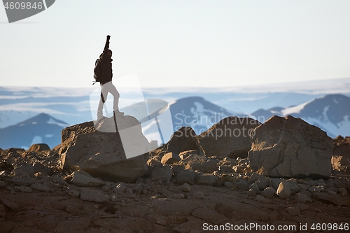 Image of Standing on a cliff