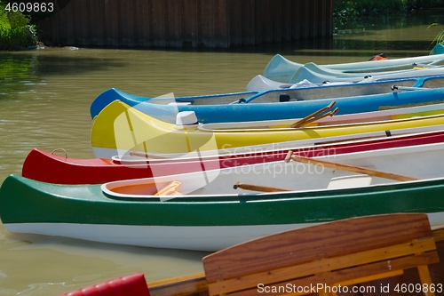 Image of Canoes on the Riverside