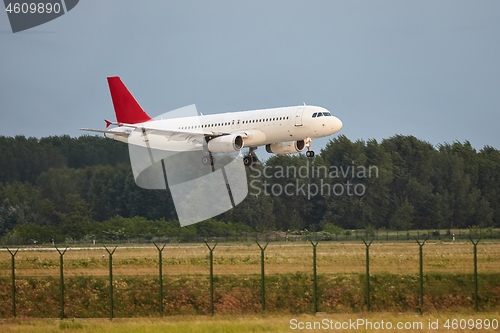 Image of Plane landing on runway