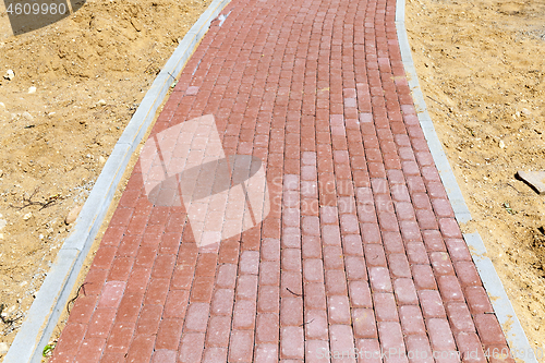 Image of Paving the footpath