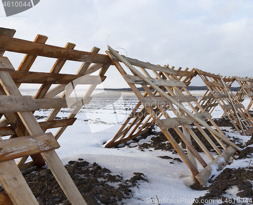 Image of Wooden fences in the field