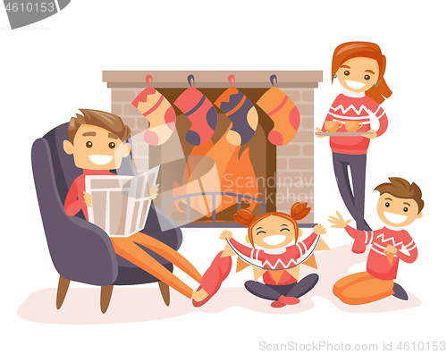 Image of Family celebrating Christmas by the fireplace.