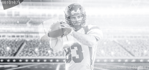 Image of american football player throwing ball