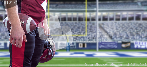 Image of closeup American Football Player isolated on big modern stadium