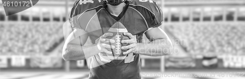 Image of closeup American Football Player isolated on big modern stadium