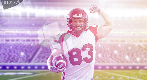 Image of american football player celebrating touchdown