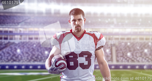 Image of American Football Player isolated on big modern stadium field