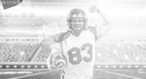 Image of american football player celebrating touchdown