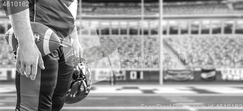 Image of closeup American Football Player isolated on big modern stadium